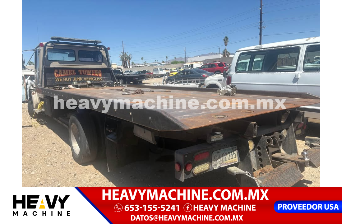 Camión Rolloff 1999 FREIGHTLINER fl60