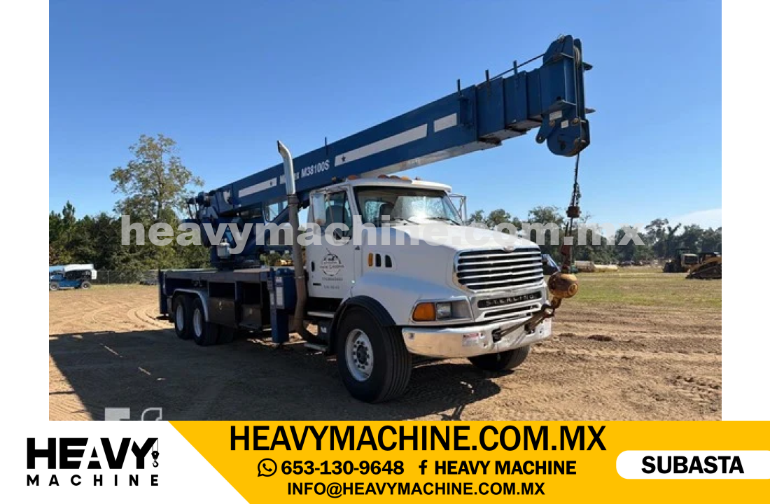 Grúa Titán 2001 STERLING L9500